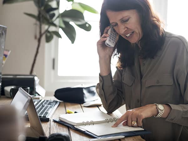 image of a woman making a phone call