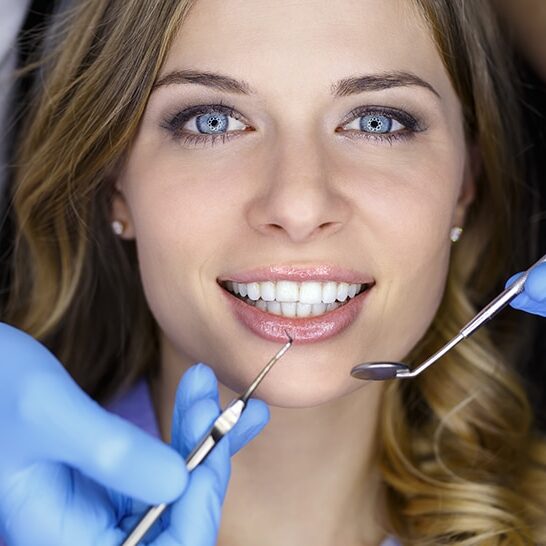 Image of a woman getting dental care