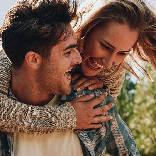 Image of a couple in the woods